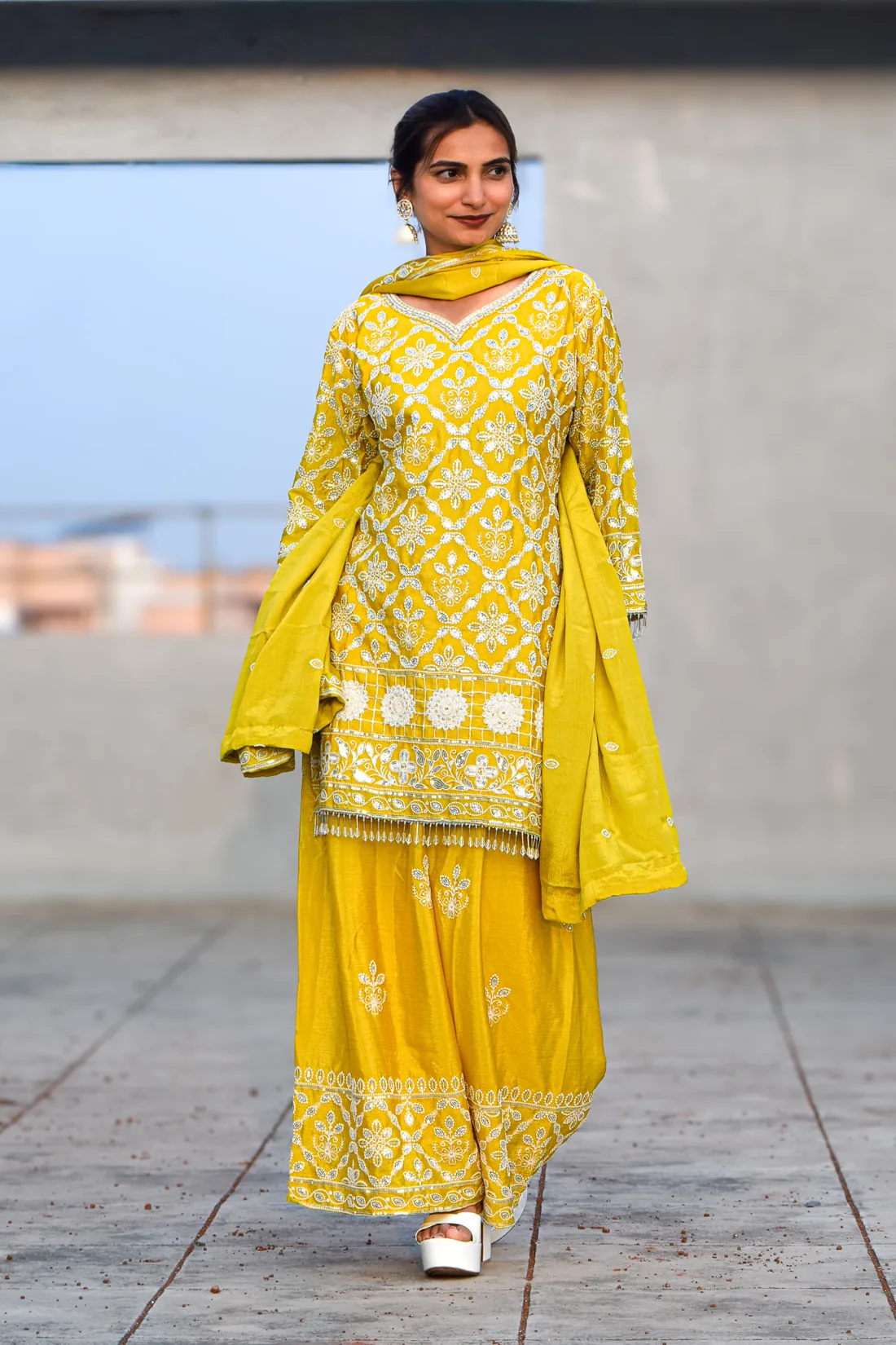 Yellow embroidered Indian designer outfit with coordinated trousers and dupatta