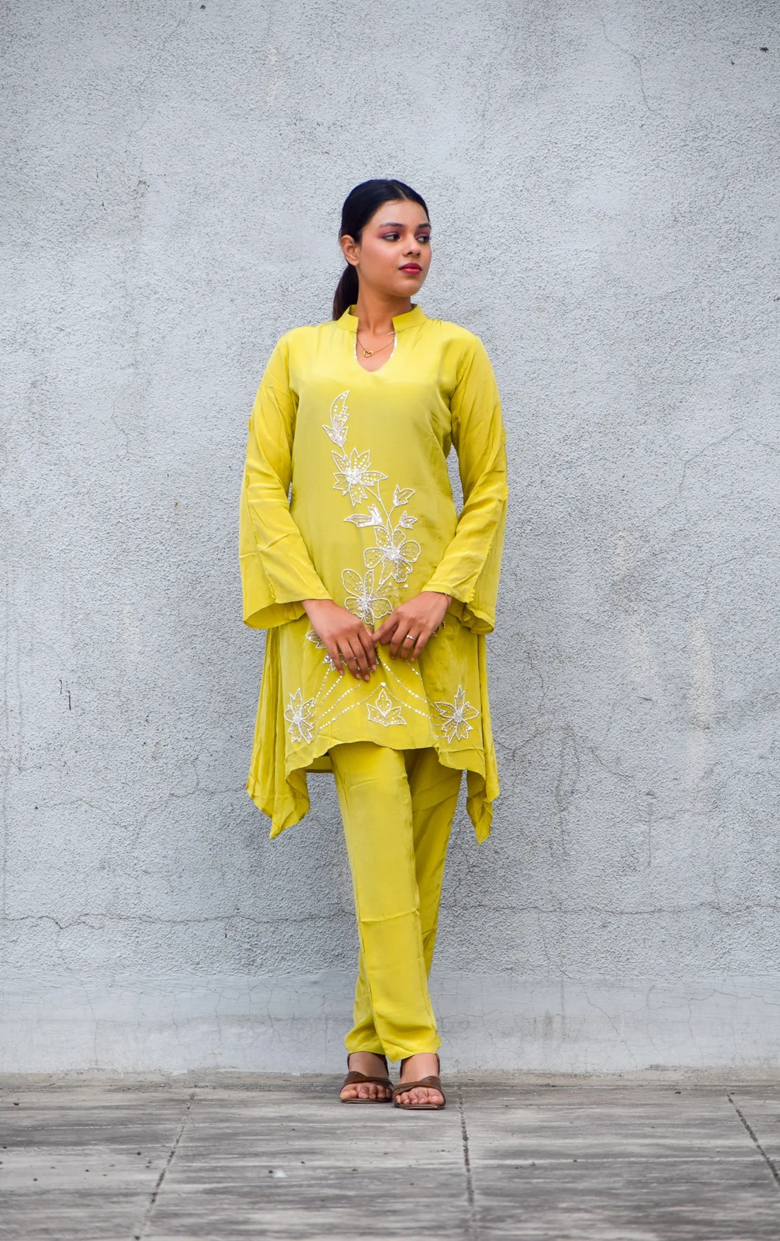 Lemon yellow embroidered kurta and coordinated trousers