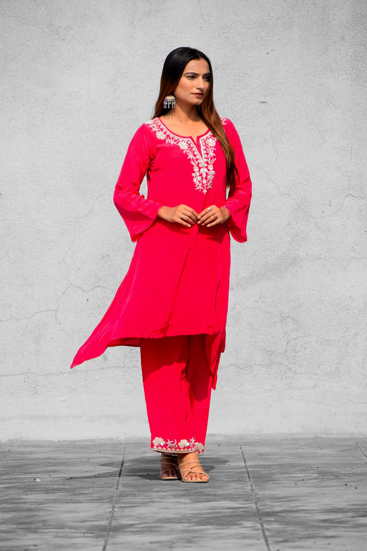 Vibrant pink embroidered kurta and matching trousers