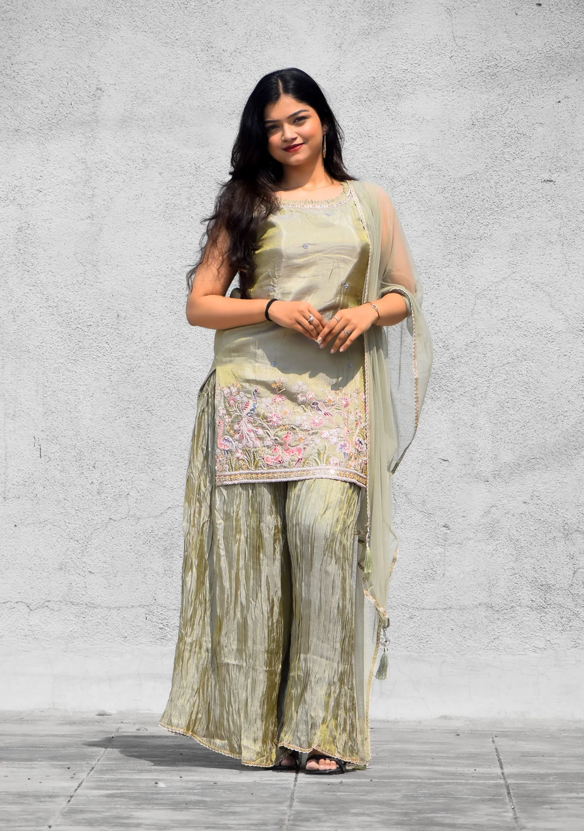 Sage green embroidered ensemble with flowing trousers